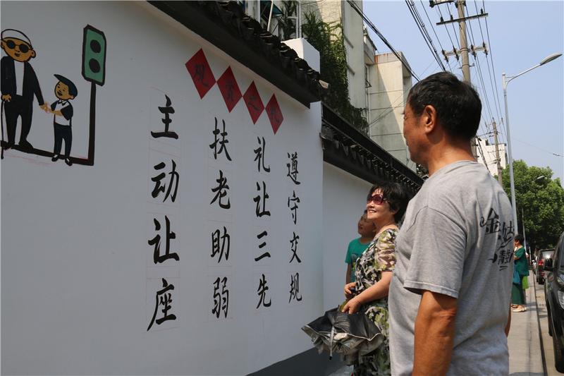 【治國(guó)理政新實(shí)踐·江蘇篇】蘇州古城現(xiàn)300米手繪墻 粉墻黛瓦“講”文明