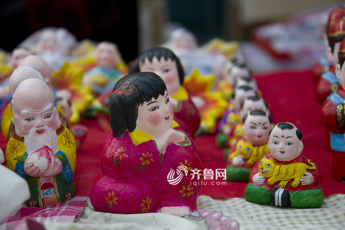 感受非遺文化 山東火把李廟會泥塑娃娃當主角[組圖]