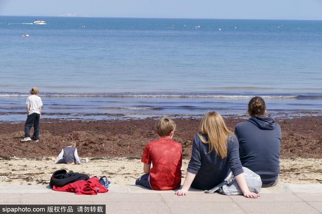 英國多塞特海邊落日 日光昏黃寧靜絕美