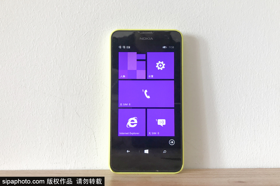 回顧改革開放40年通訊工具變遷 90年代“大哥大” 3萬(wàn)元