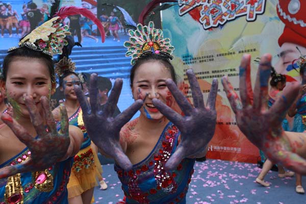 湘西土家摸泥節在北京啟動,“摸泥示愛”展現民族文化魅力