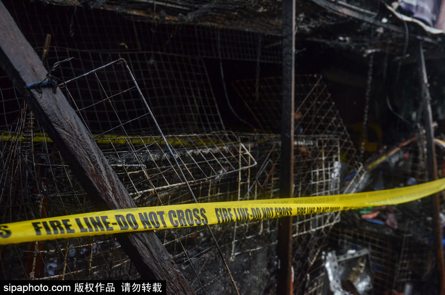 菲律賓市場火災后現場狼藉 市民工作生活仍在繼續