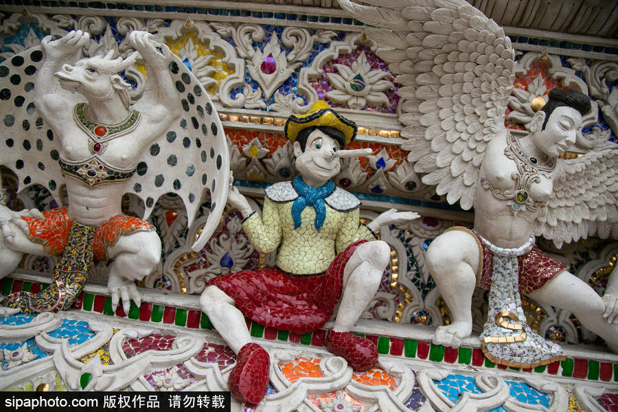 泰國曼谷一廟宇驚現超人、皮卡丘等動漫雕像 跨界裝飾創意無窮！