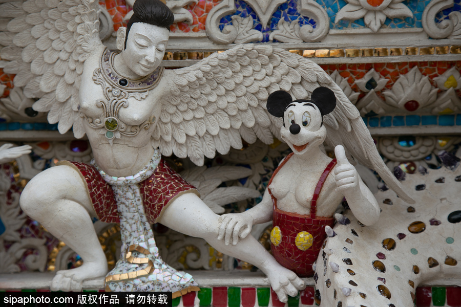 泰國曼谷一廟宇驚現(xiàn)超人、皮卡丘等動(dòng)漫雕像 跨界裝飾創(chuàng)意無窮！