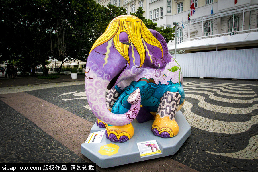 城市變“露天畫廊”！巴西里約熱內盧街頭大象雕塑“穿新衣”